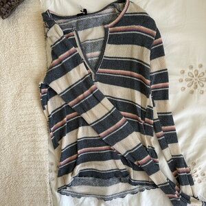 Stretchy urban outfitters sweater with v neck design